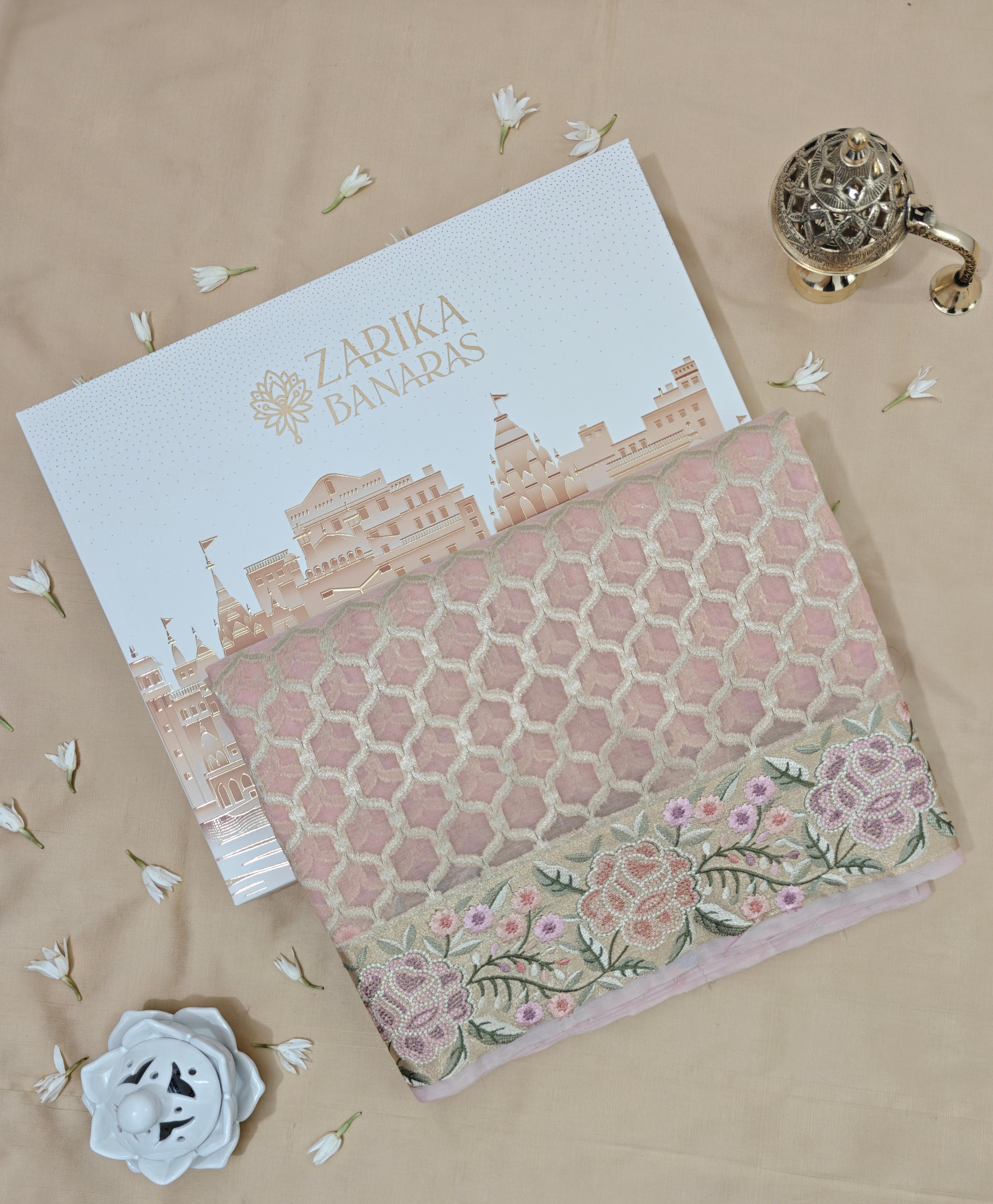 Graceful Pink Organza Saree with All-Over Zari Work