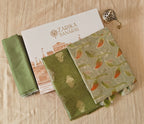 Parrot Green Tissue Silk Suit with Crushed Tissue Meenakari Dupatta