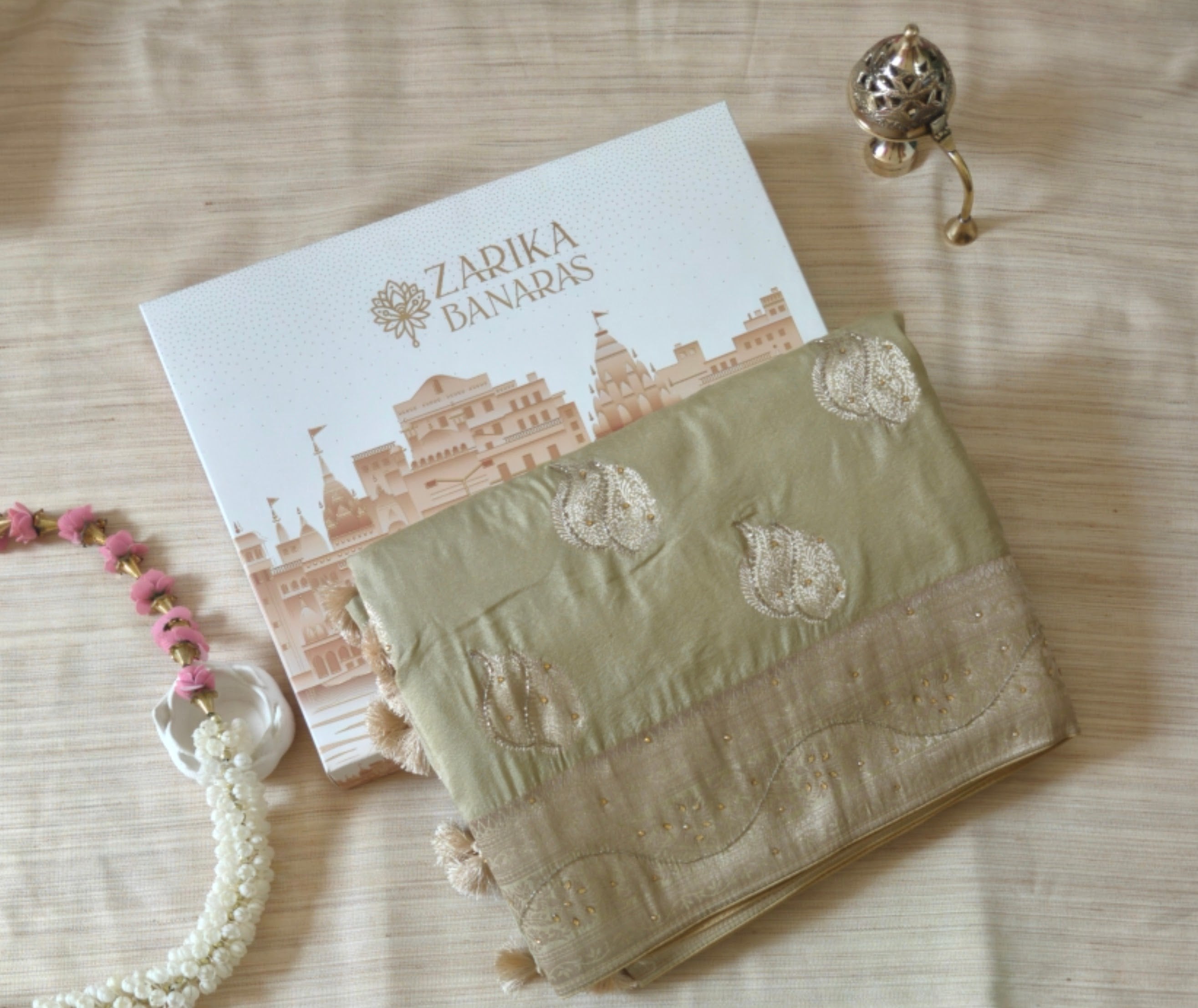 Elegant Cream Butter Crepe Saree with All-Over Handwork Detailing