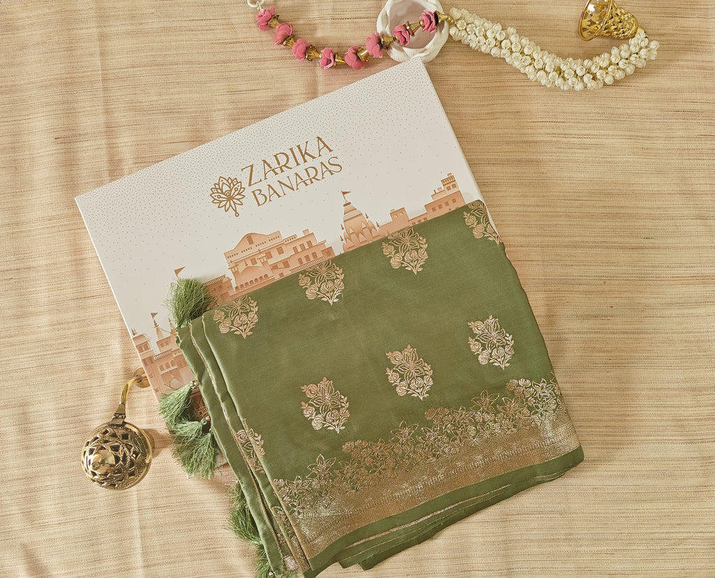 Pastel green Banarasi Silk saree with Floral booti & Stunning Border