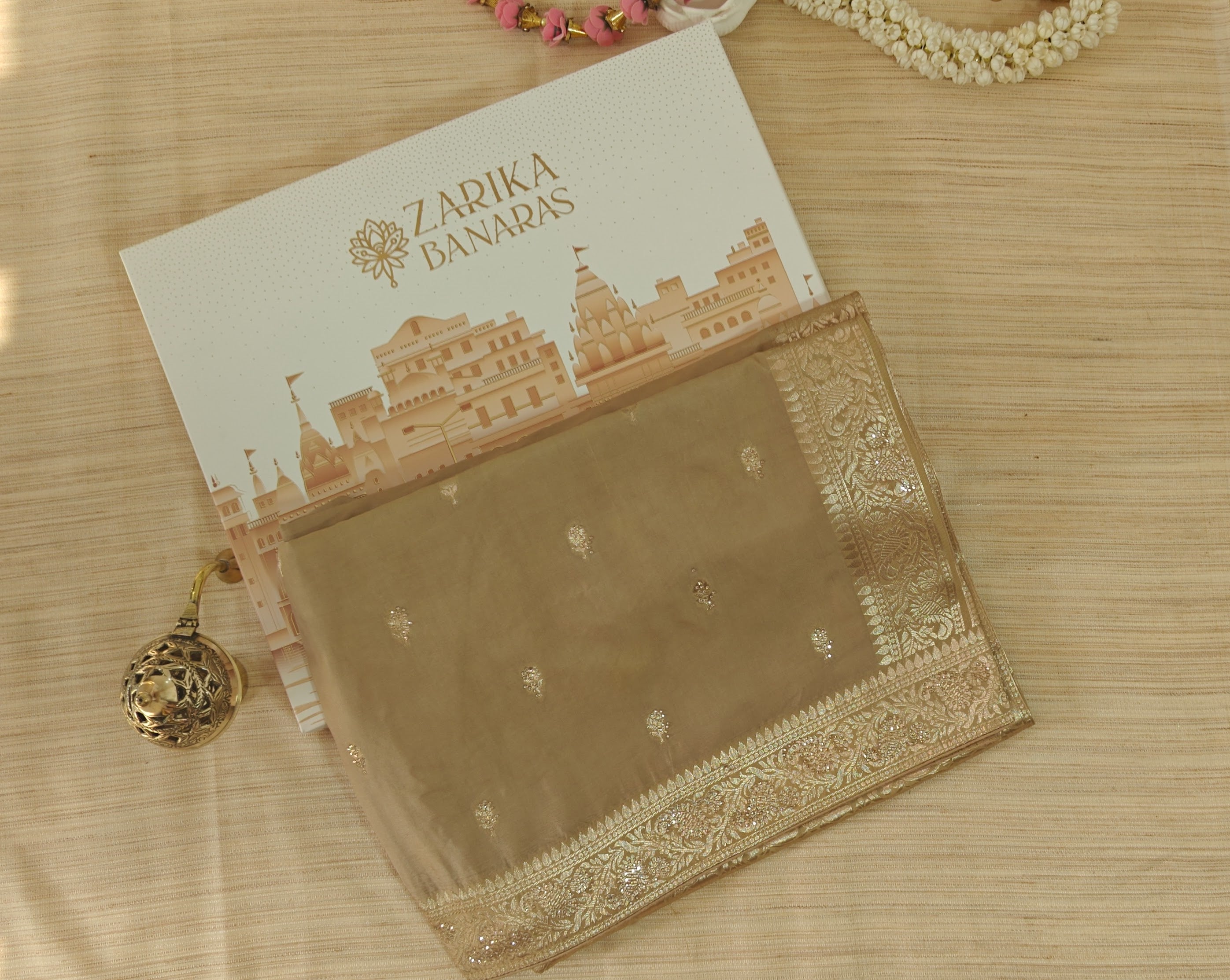 Designer Saree in Soft Butter Crepe with Elegant Drape & Rich Swarovski detailing