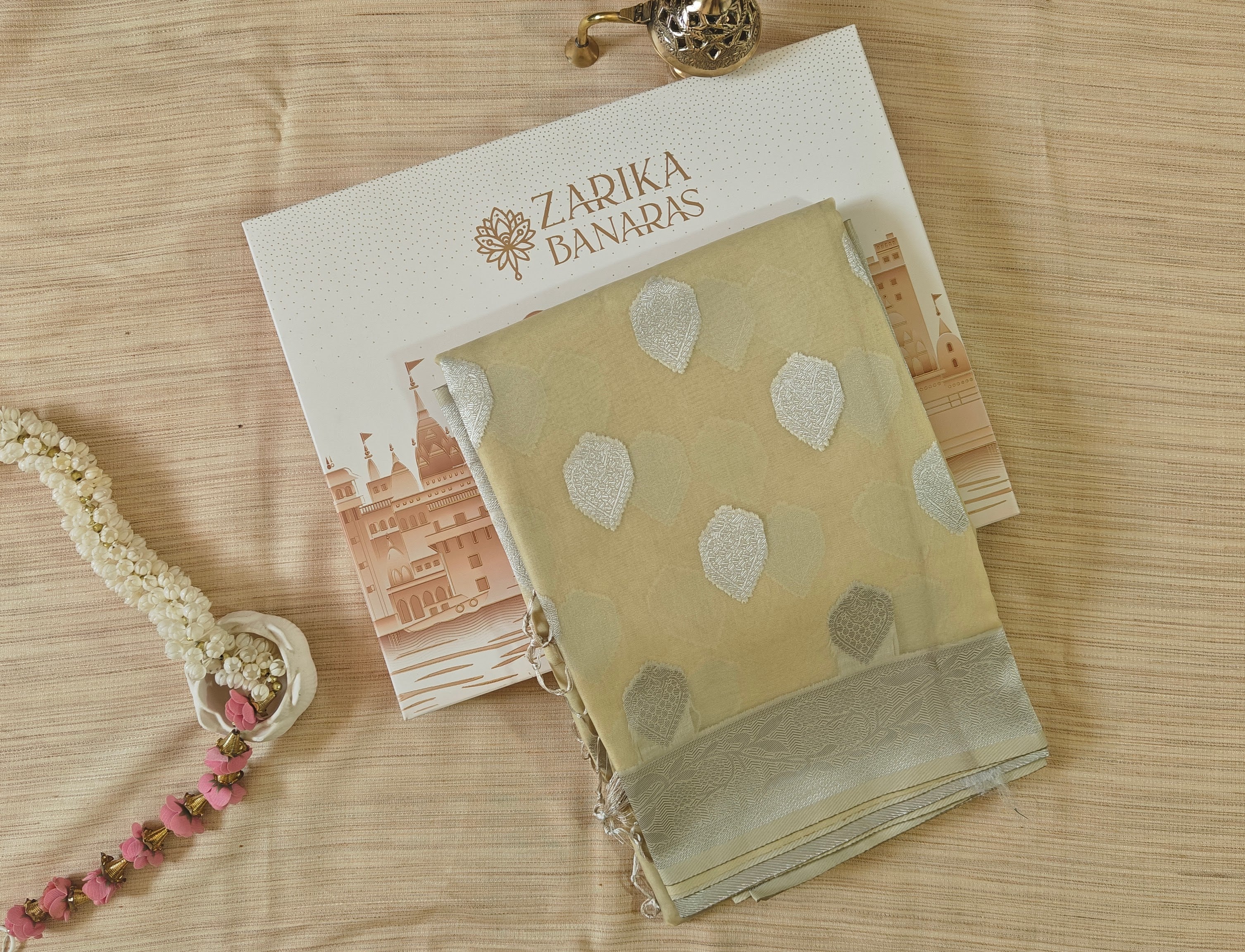 Light Yellow Cream Organza Saree with Silver Zari Booti & Brocade Blouse