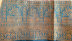 Metallic Golden Tissue Saree with Peacock Motifs & Statement Border