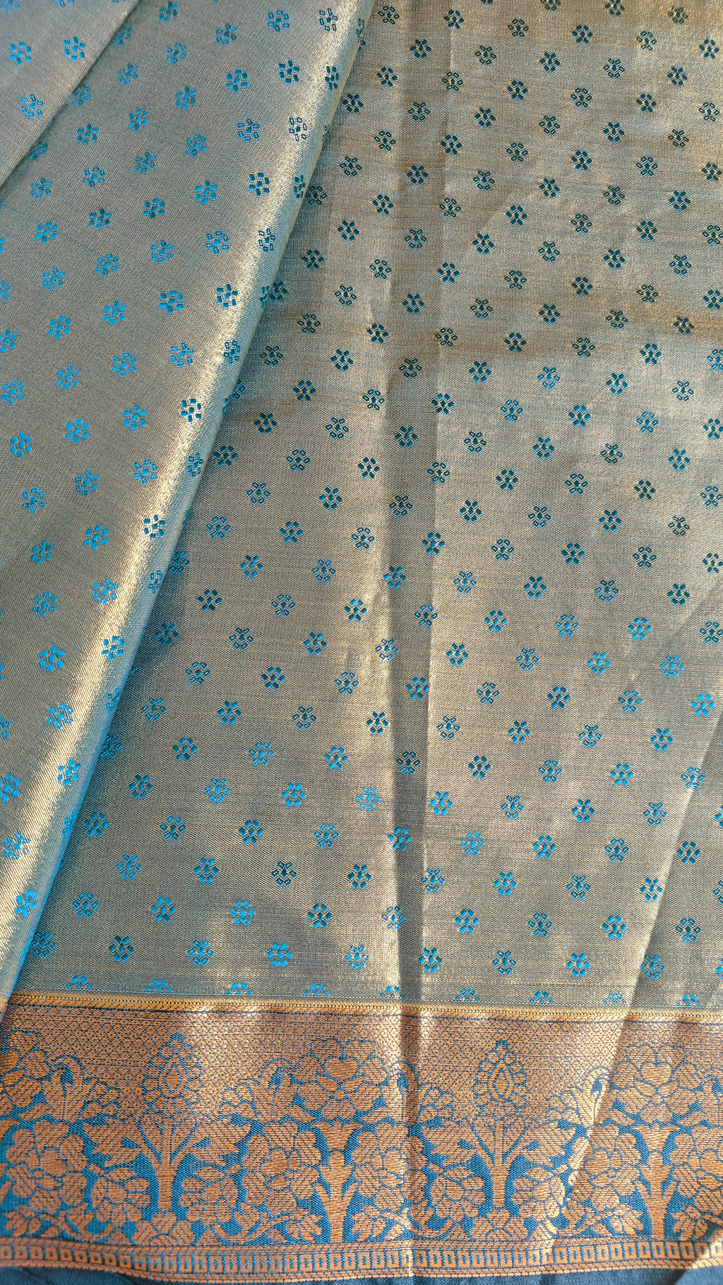 Metallic Golden Tissue Saree with Peacock Motifs & Statement Border