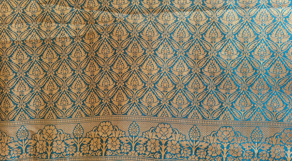 Metallic Golden Tissue Saree with Peacock Motifs & Statement Border