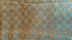 Metallic Golden Tissue Saree with Peacock Motifs & Statement Border