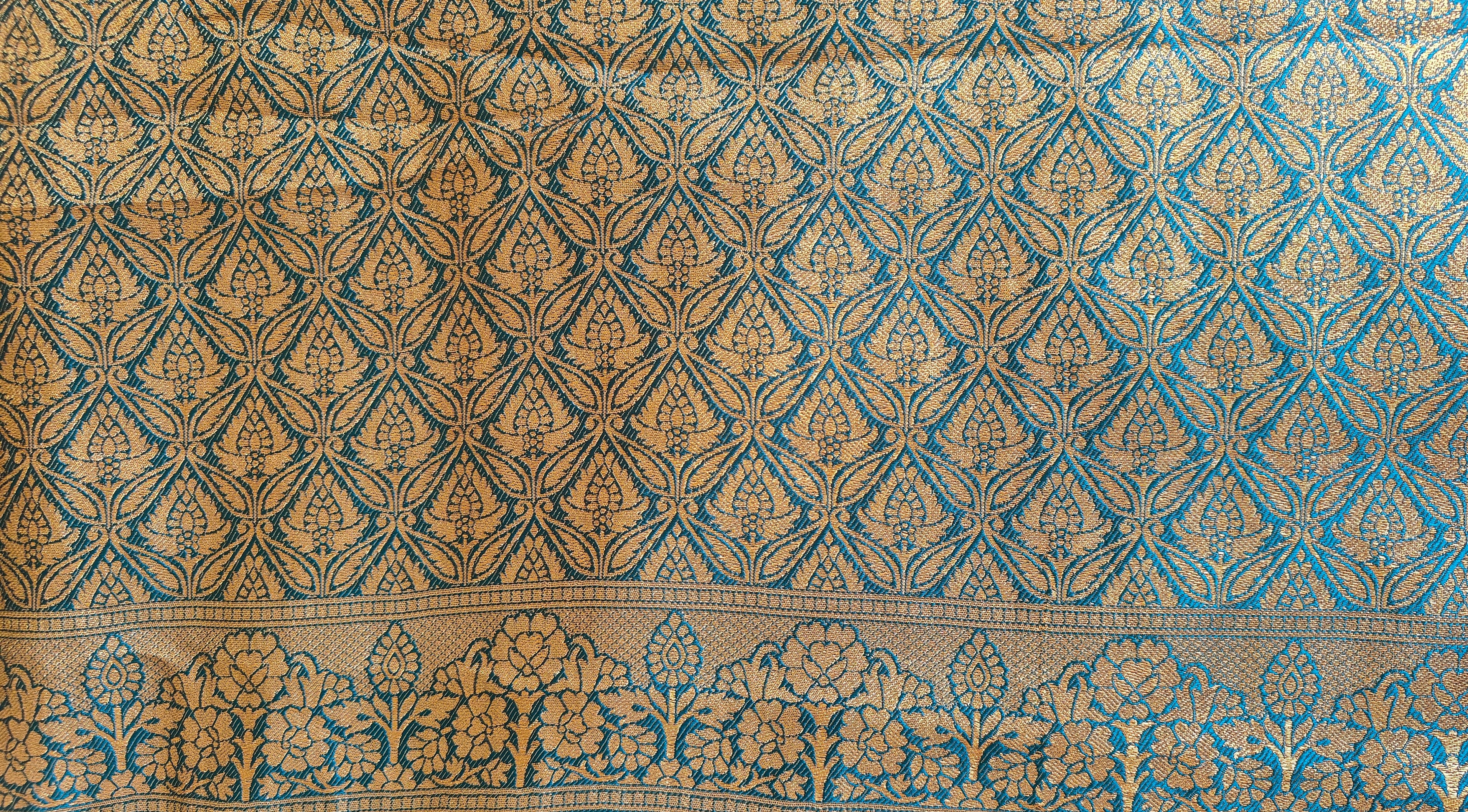 Metallic Golden Tissue Saree with Peacock Motifs & Statement Border