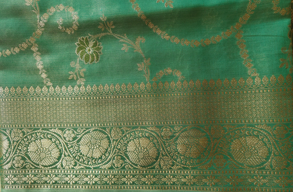 Elegant sea green Shimmer Tissue Saree with Meenakari Floral Work