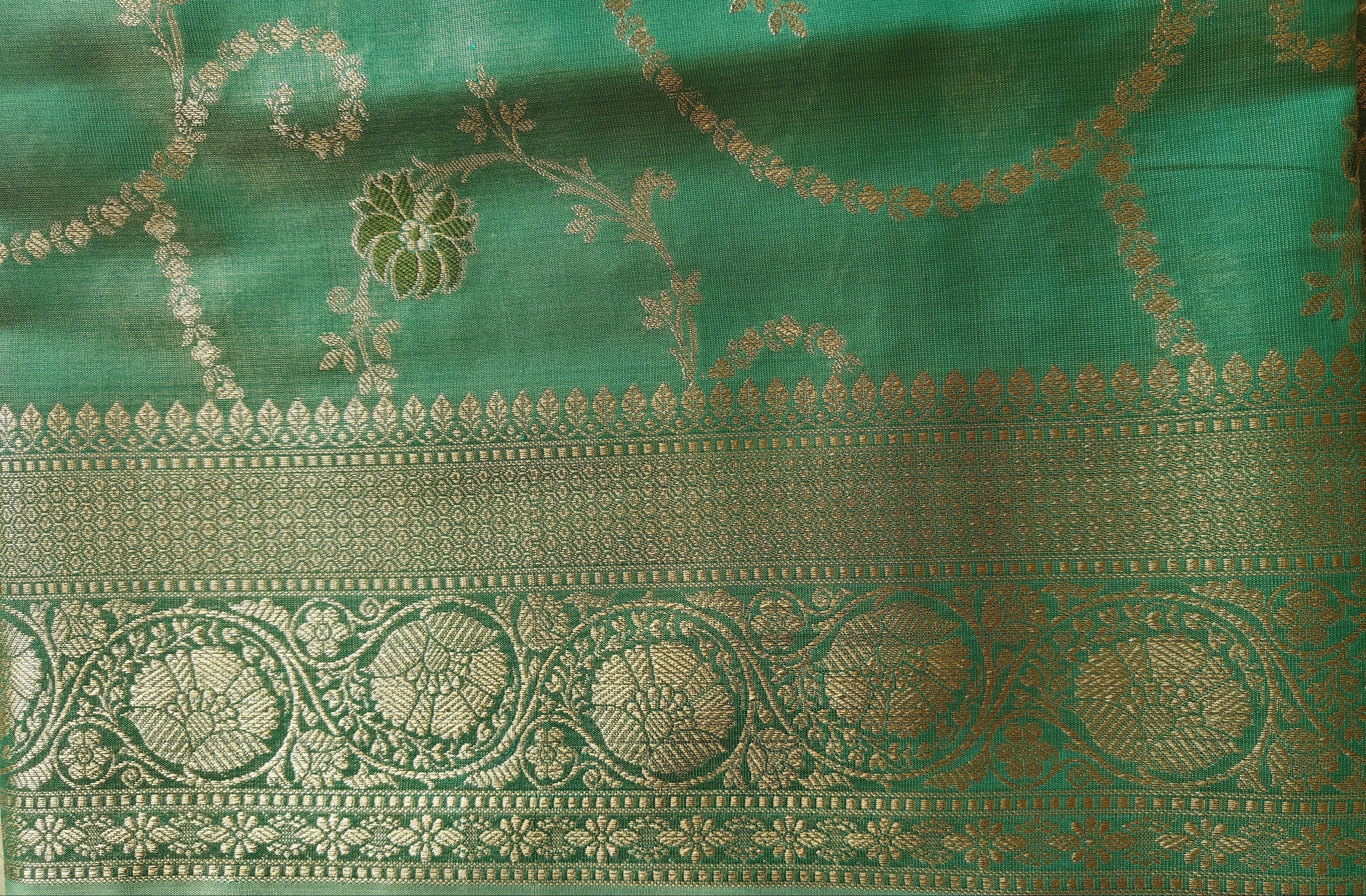 Elegant sea green Shimmer Tissue Saree with Meenakari Floral Work