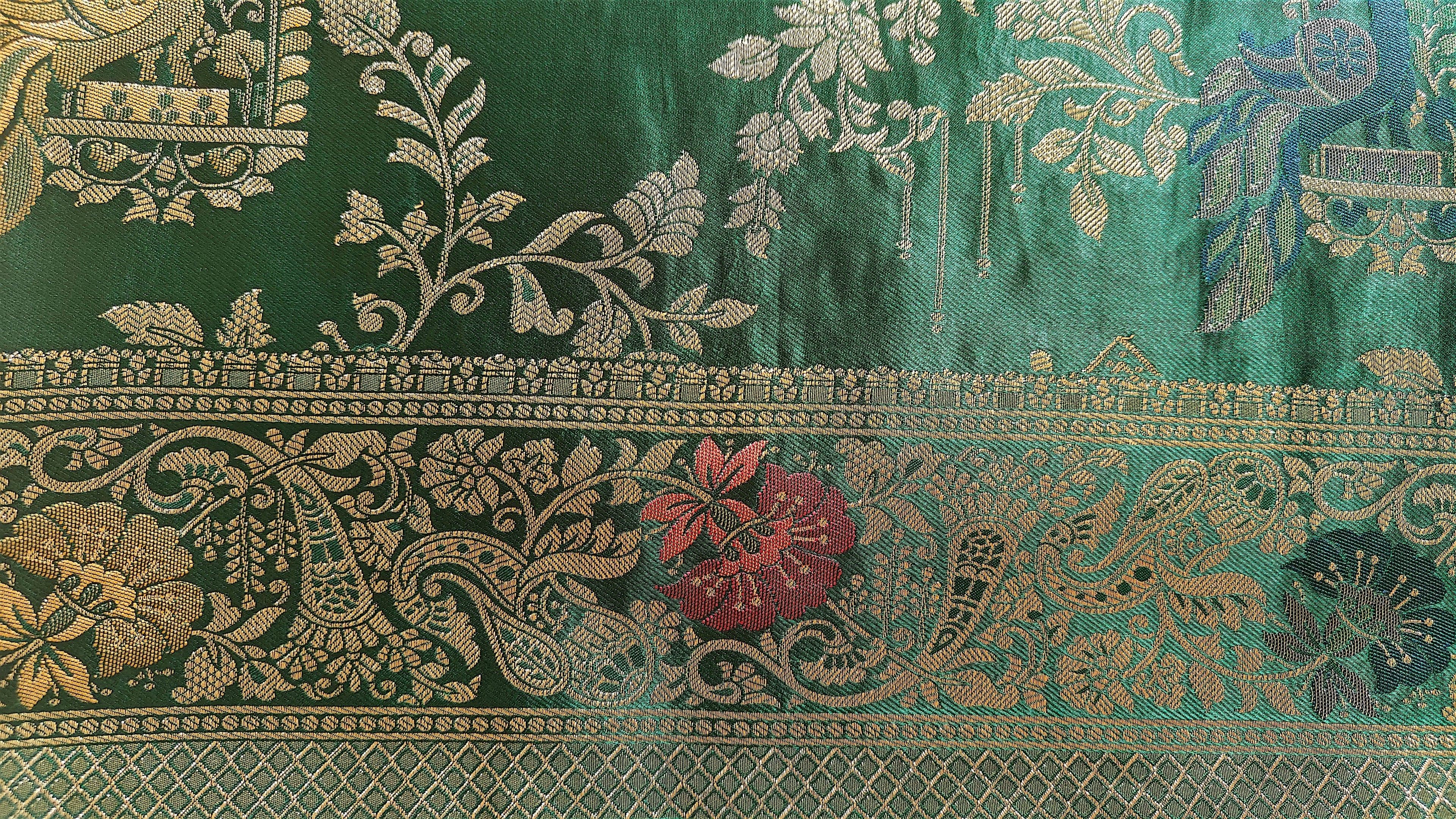 Dark Green Banarasi Silk Saree with Peacock Jaal Work