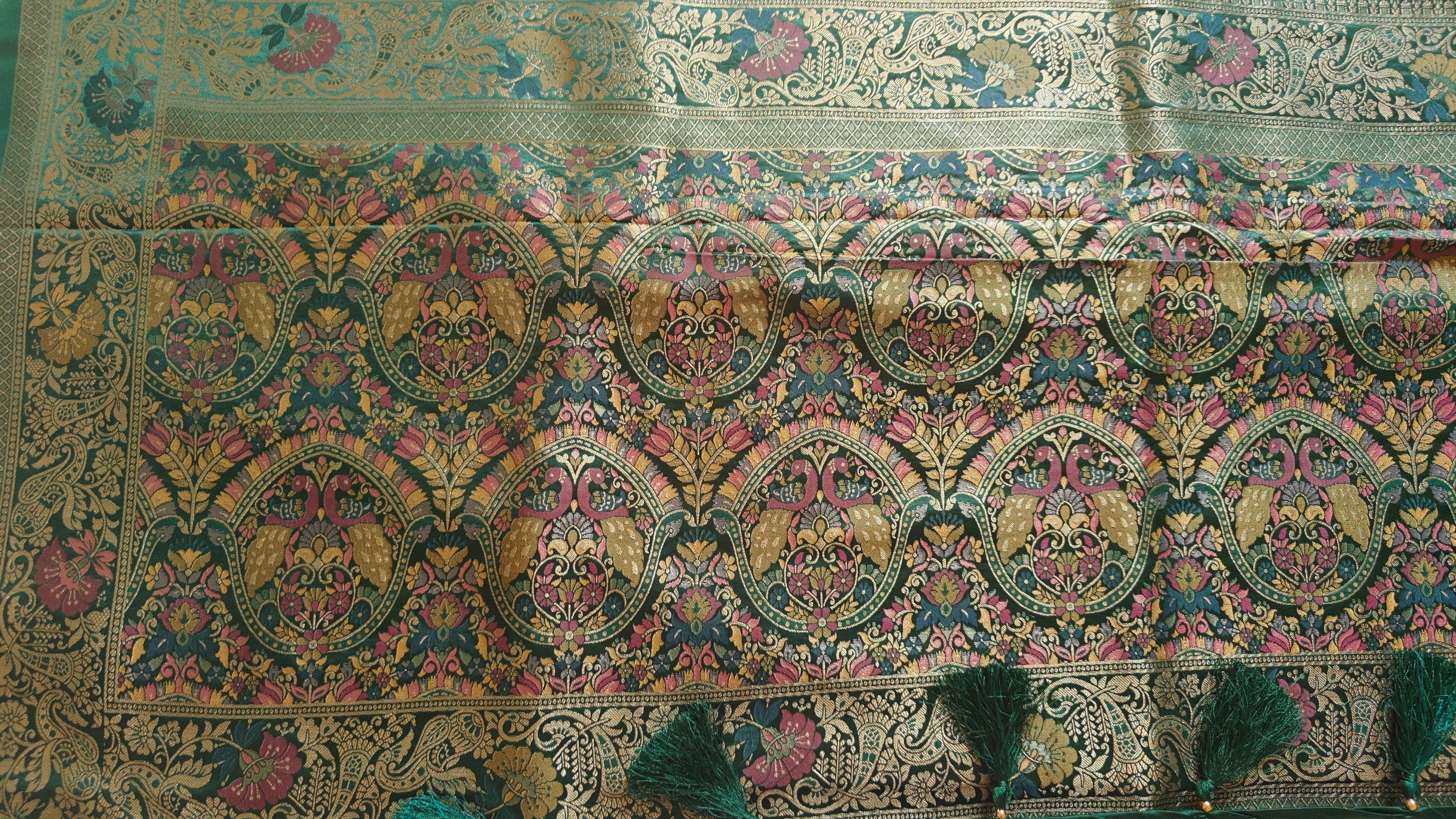 Dark Green Banarasi Silk Saree with Peacock Jaal Work