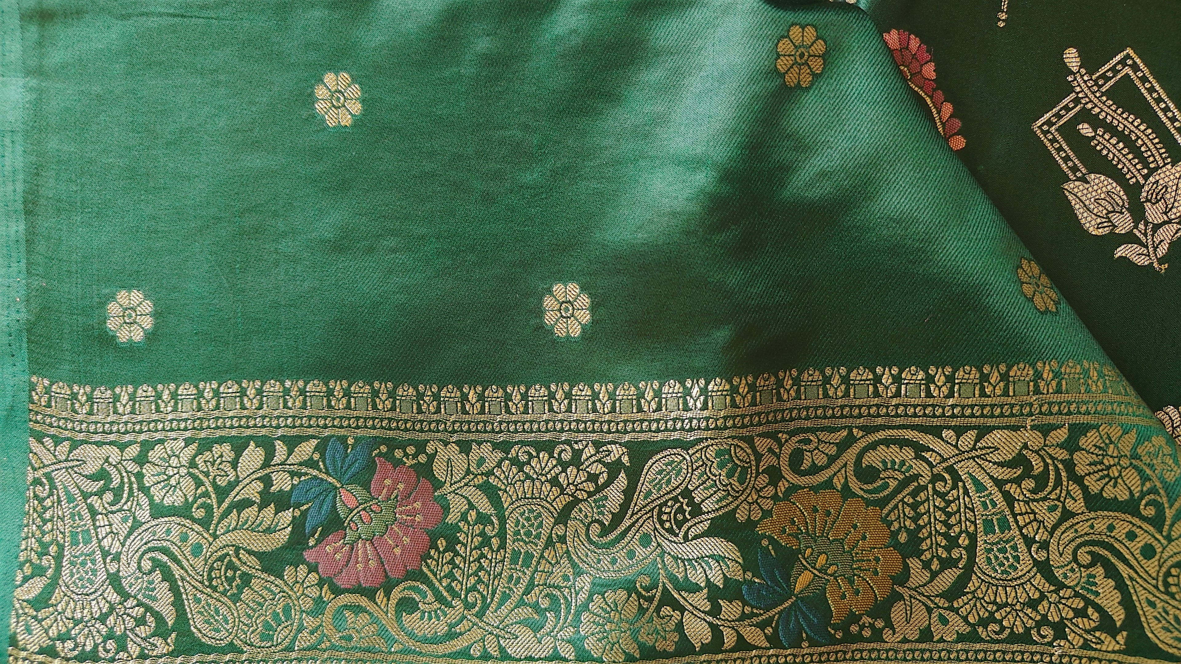Dark Green Banarasi Silk Saree with Peacock Jaal Work