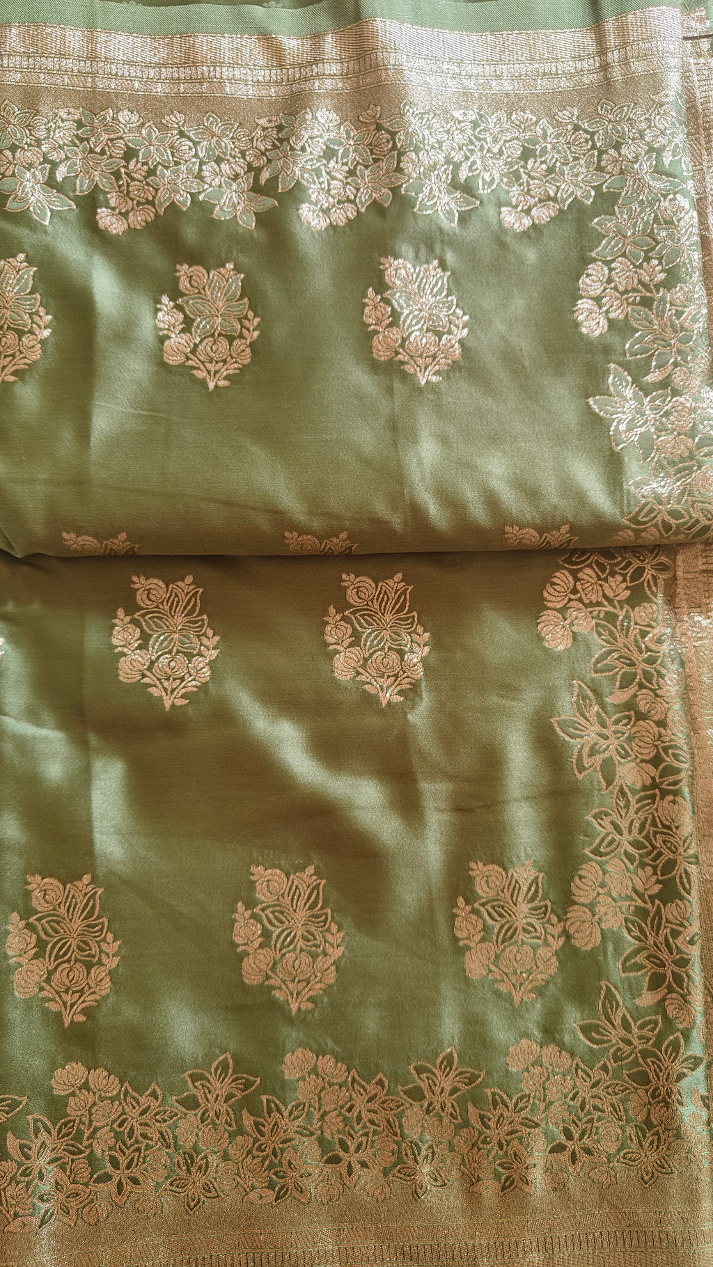 Pastel green Banarasi Silk saree with Floral booti & Stunning Border