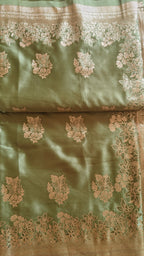 Pastel green Banarasi Silk saree with Floral booti & Stunning Border