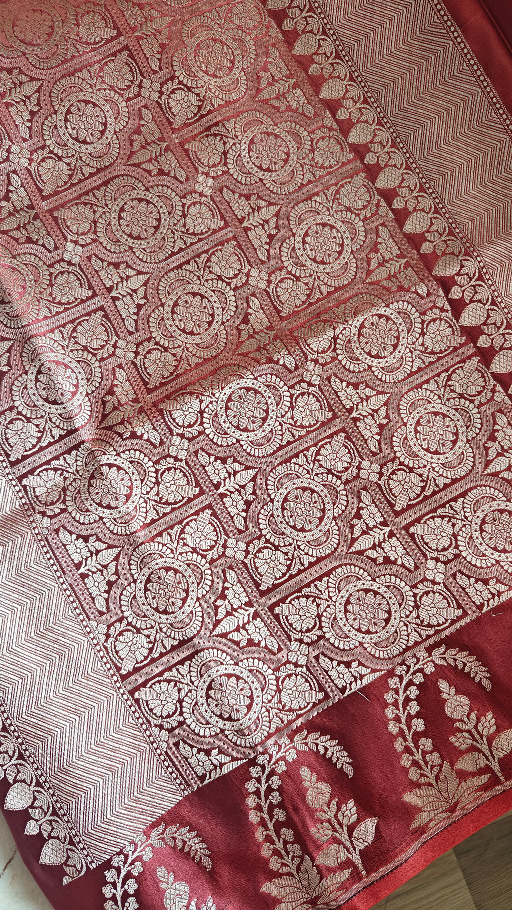 Rust Silk Saree with small zari Booti & Statement Border
