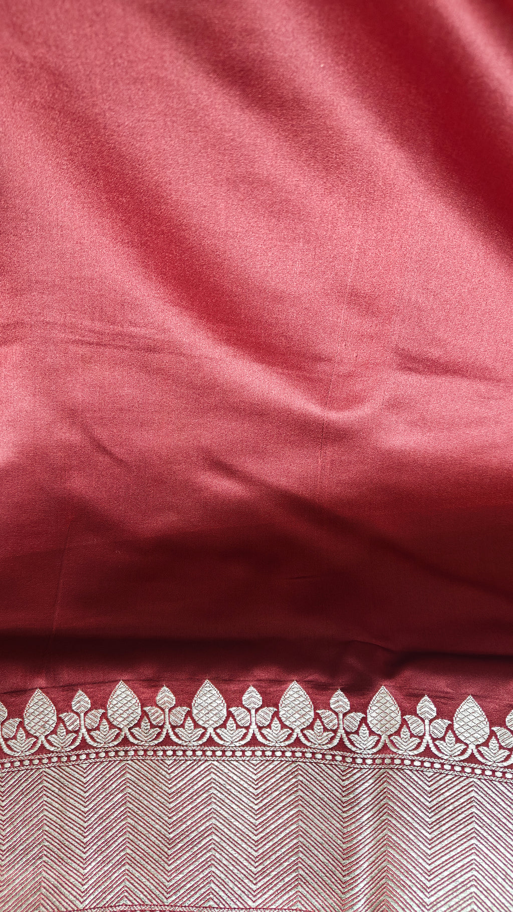 Rust Silk Saree with small zari Booti & Statement Border