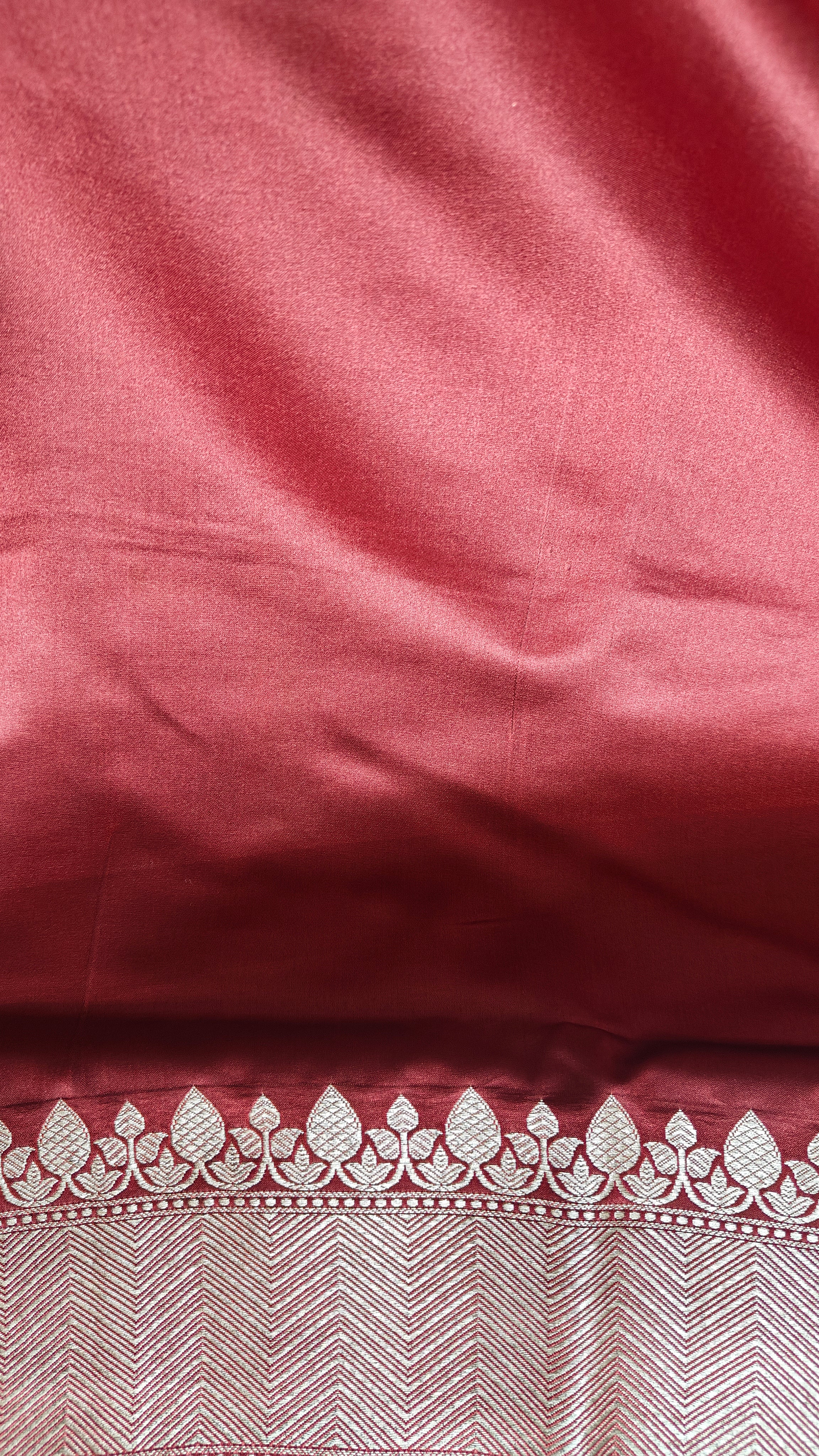 Rust Silk Saree with small zari Booti & Statement Border
