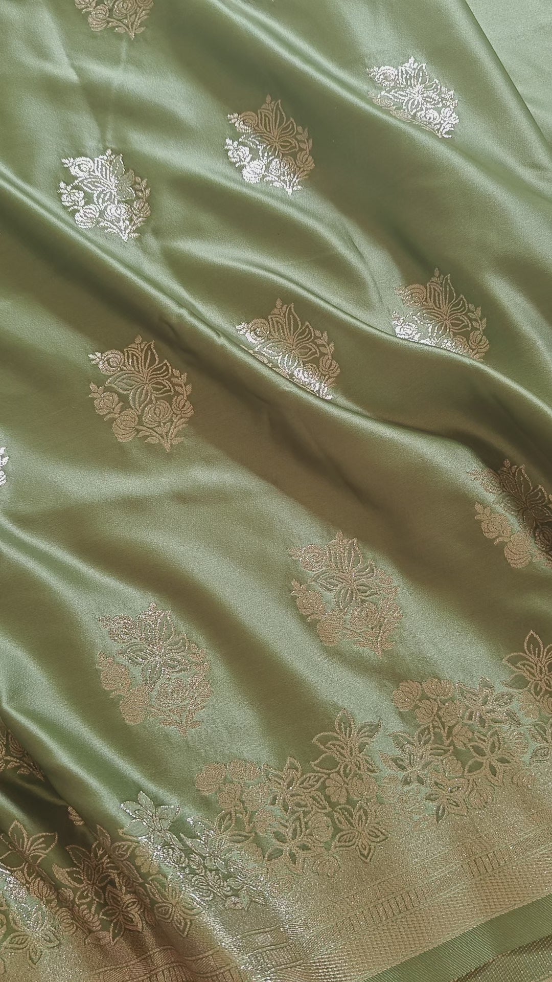 Pastel green Banarasi Silk saree with Floral booti & Stunning Border