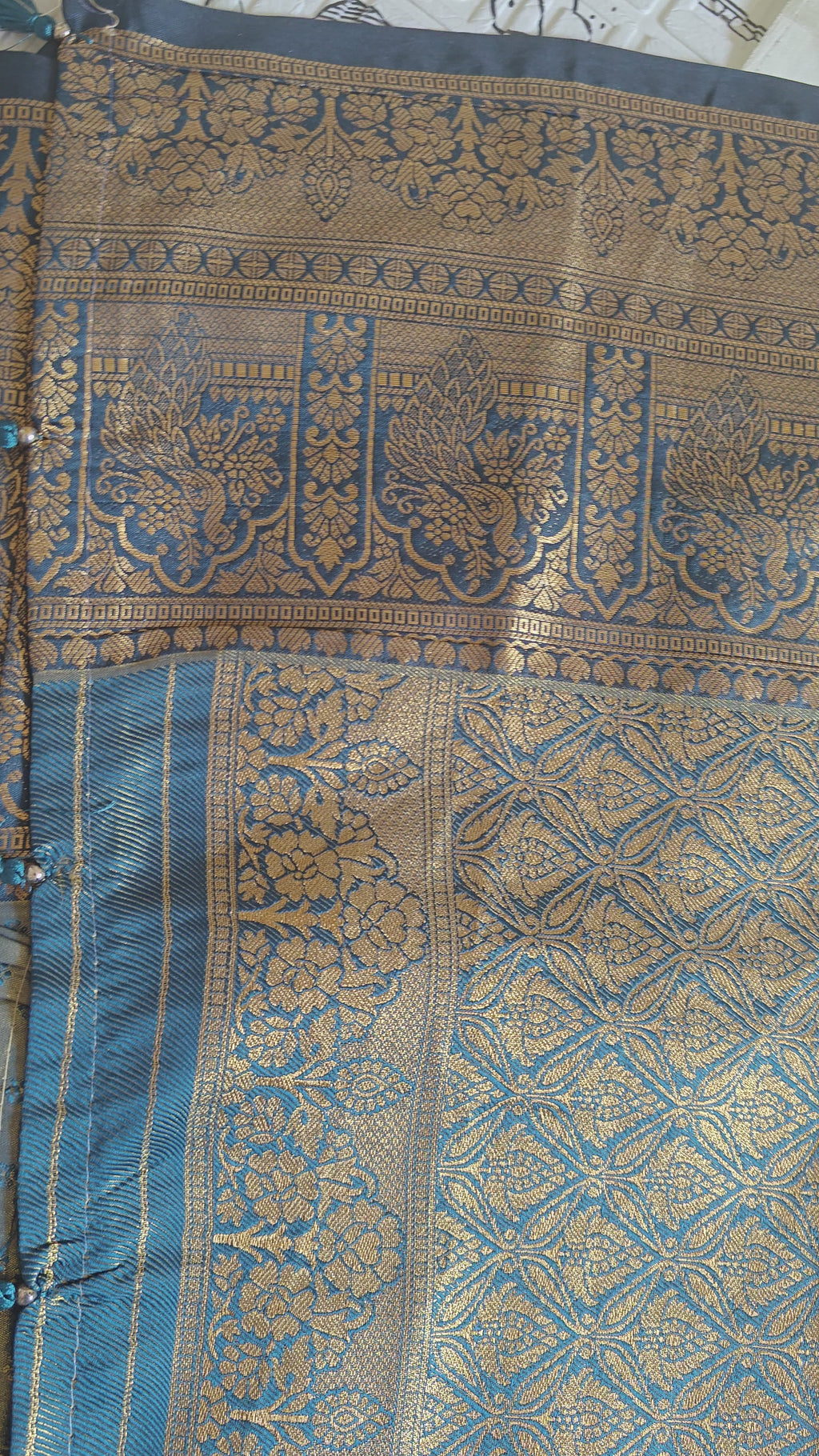 Metallic Golden Tissue Saree with Peacock Motifs & Statement Border