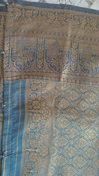 Metallic Golden Tissue Saree with Peacock Motifs & Statement Border