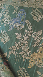 Dark Green Banarasi Silk Saree with Peacock Jaal Work