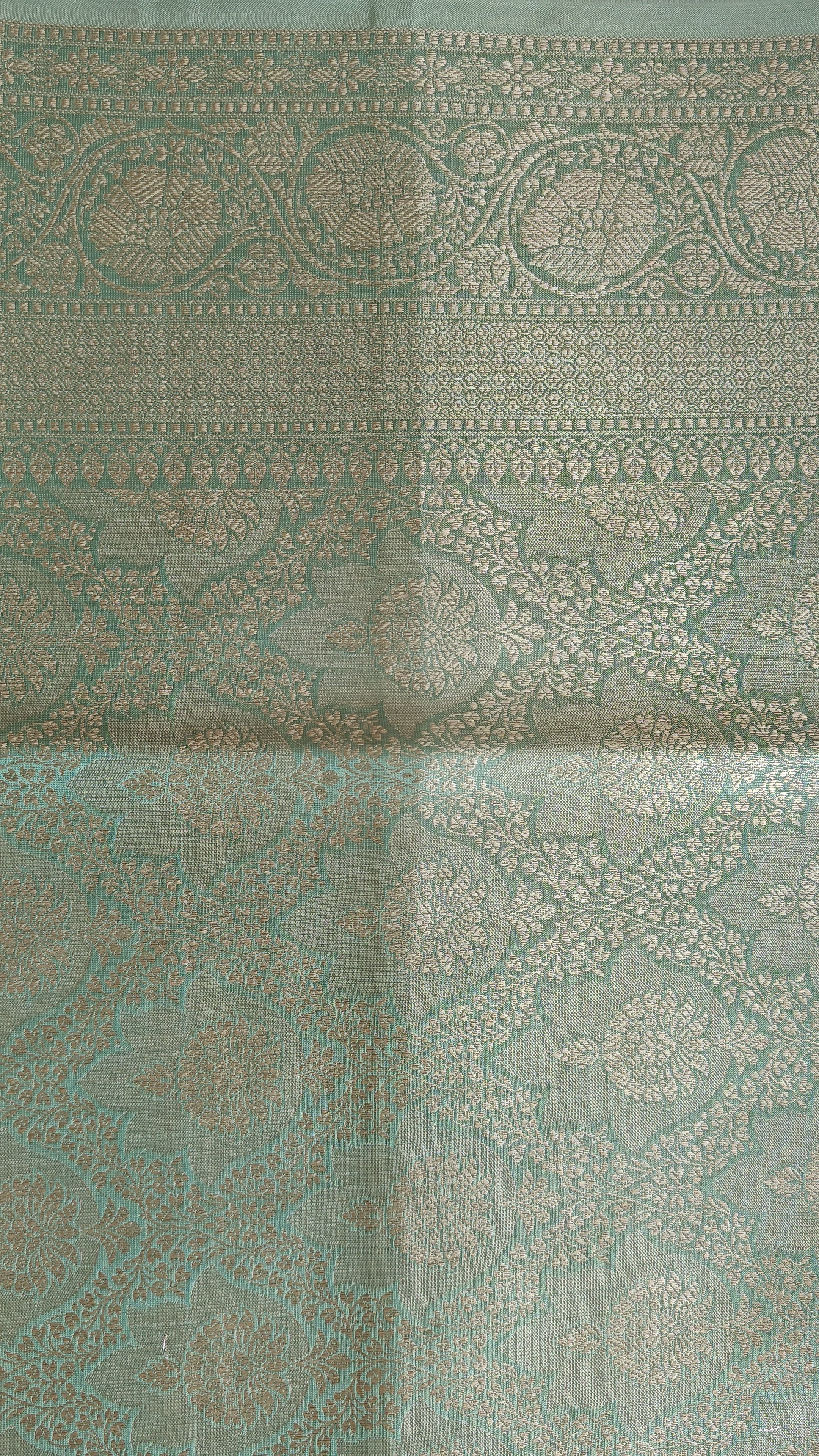 Elegant sea green Shimmer Tissue Saree with Meenakari Floral Work